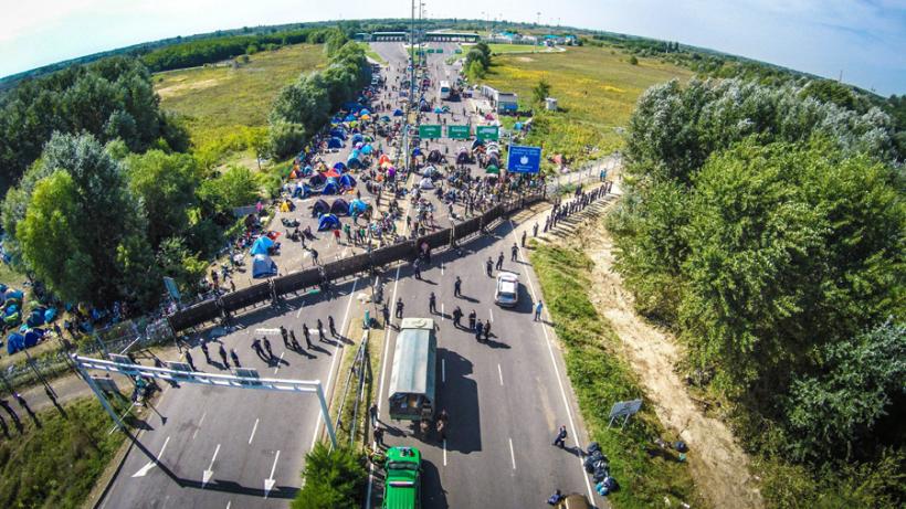Cotele obligatorii de migranţi - argumente pro şi contra ale europarlamentarilor români 
