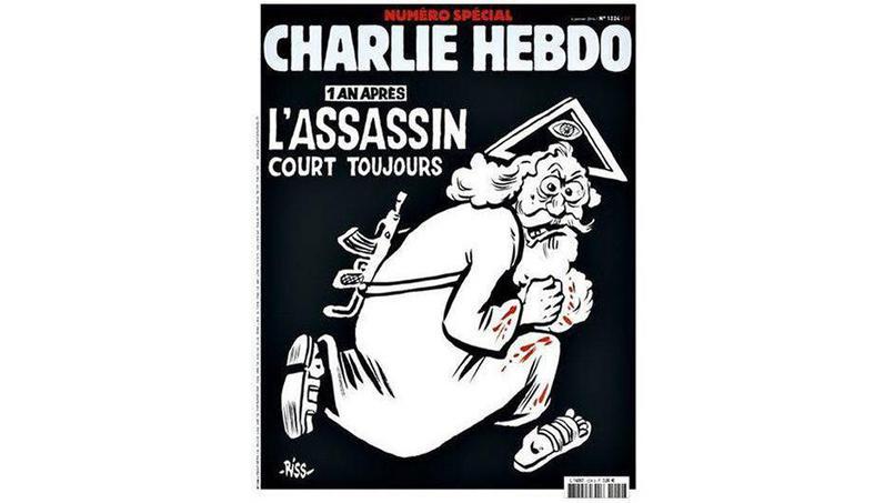 La un an de la atentate, Charlie Hebdo renunţă la Mahomed şi îl abordează pe &quot;Dumnezeul asasin&quot;