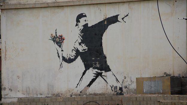 Oamenii de știință britanici spun că l-ar fi identificat pe misteriosul artist Banksy