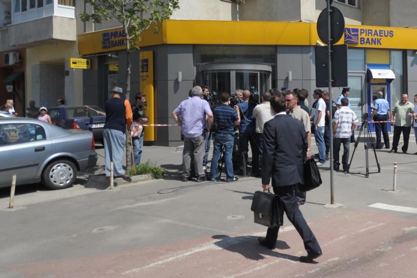 Piraeus Bank confirmă oficial că închide 19 sucursale din oraşe mici şi mijlocii