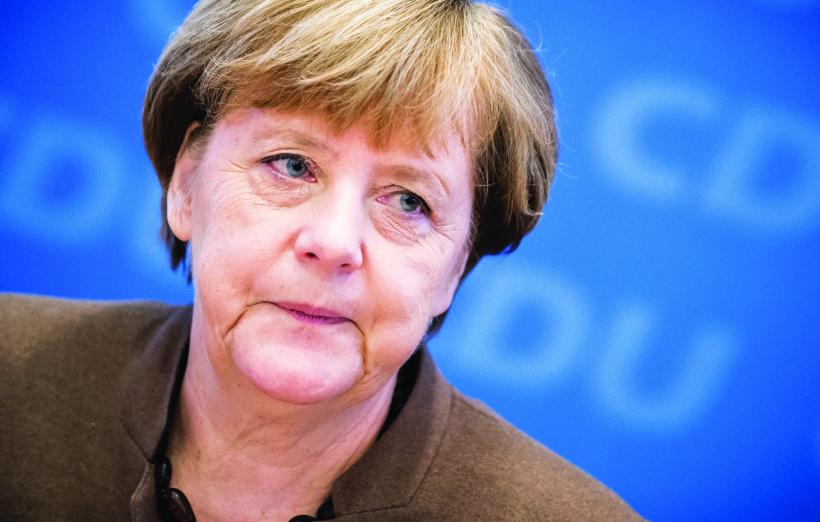 Refugiaţii o costă pe Merkel la urne