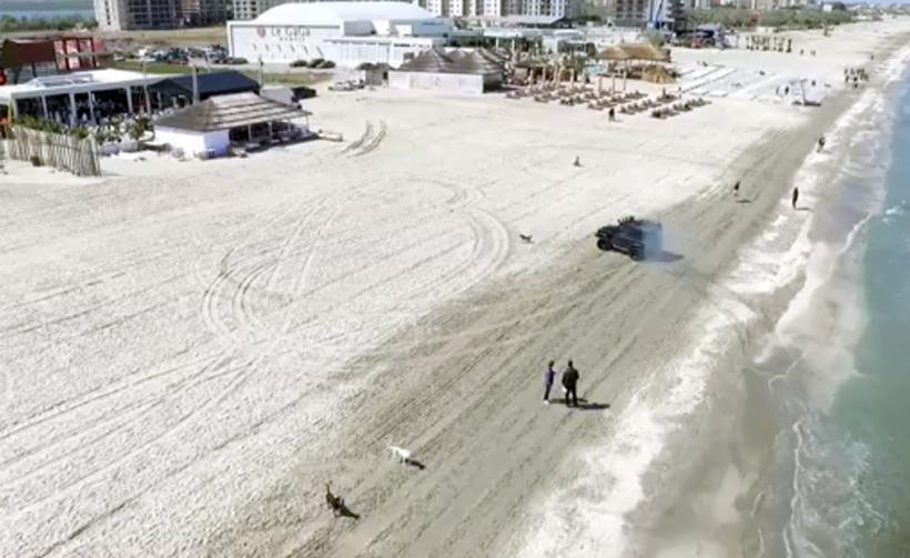 VIDEO - Această plimbare cu mașina de teren pe plajă l-a costat scump
