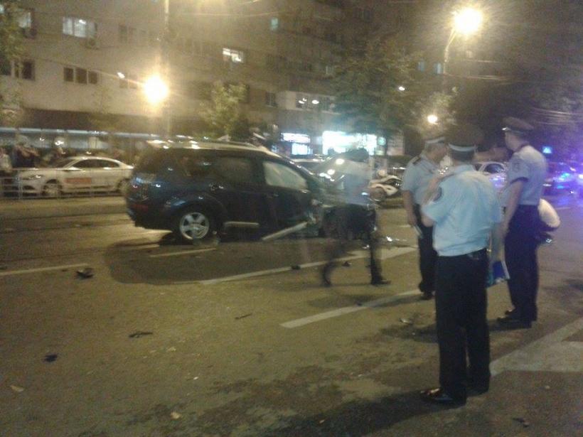 FOTO Accident GRAV în Capitală. Șapte masini avariate. Doua persoane rănite  18547227