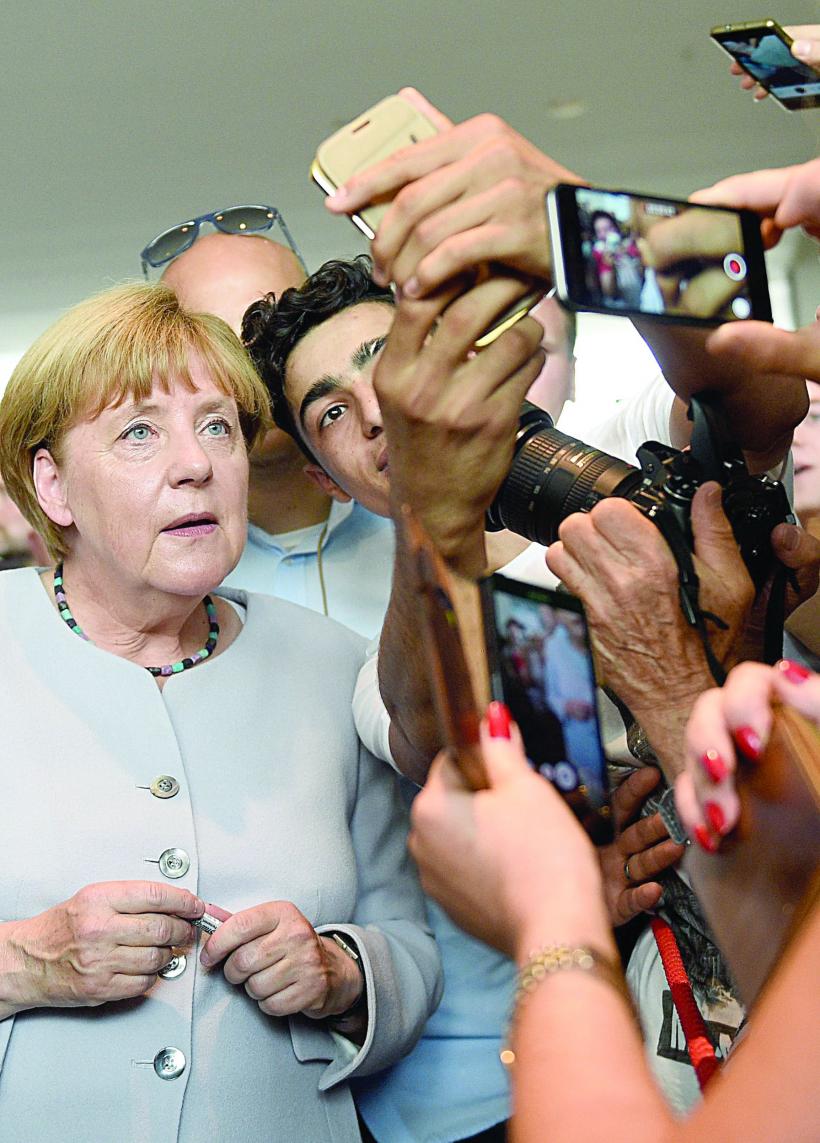 Criza refugiaților: Merkel vede erori