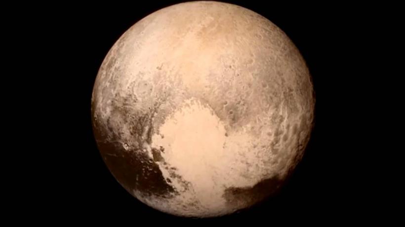 Astronomii au descoperit cauza depresiunii in formă de inimă de pe Pluto