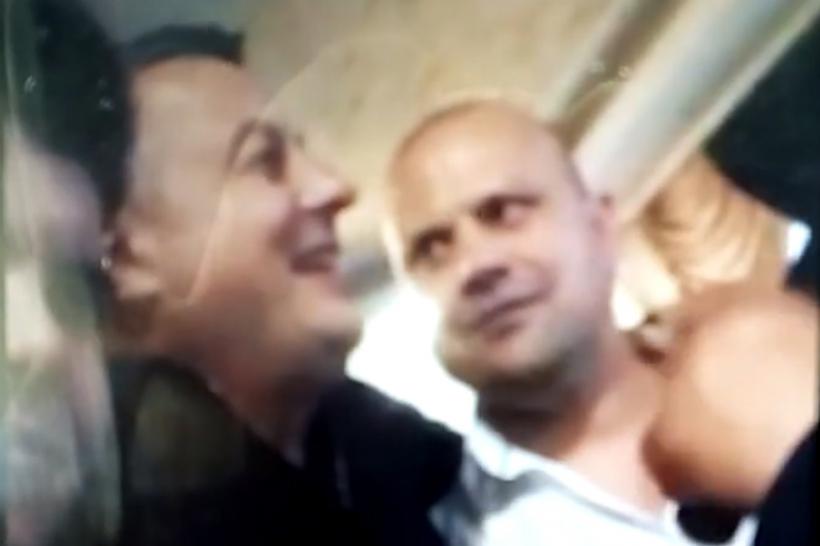 VIDEO - Polițist de la Biroul de Investigații Criminale Tecuci surprins când se săruta pe gură cu un interlop