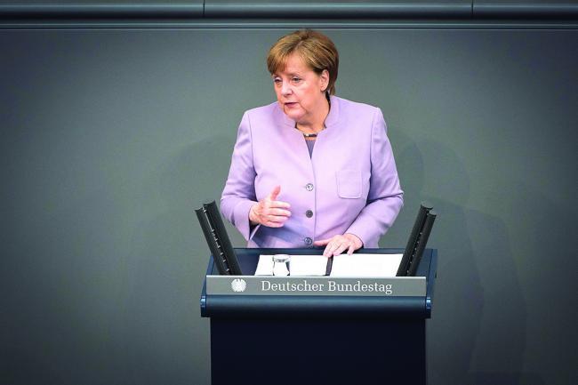 Angela Merkel este acuzată de trădare