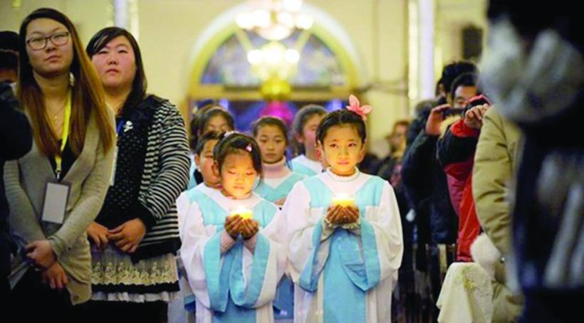Copiii chinezi nu mai au voie la biserică