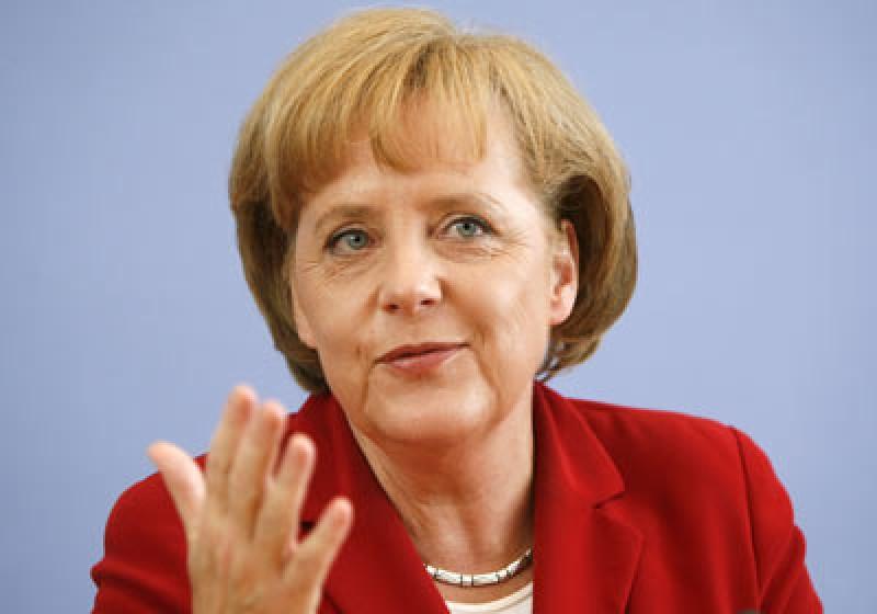UE: Angela Merkel și Jean-Claude Juncker au discutat despre criza catalană