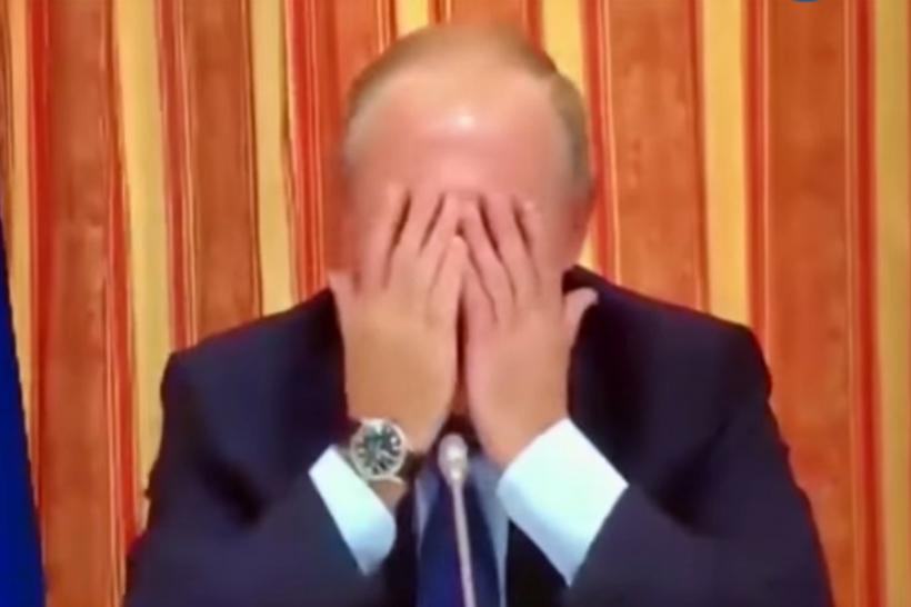 VIDEO -  Putin râde copios în timpul unei întâlniri oficiale