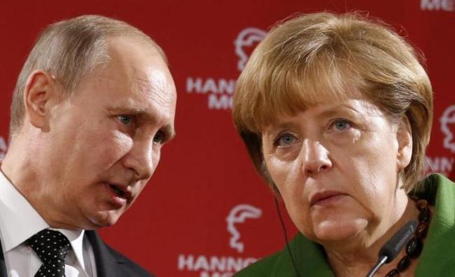 Angela Merkel şi Vladimir Putin au convenit să depună eforturi în scopul întoarcerii observatorilor ruşi în estul Ucrainei 