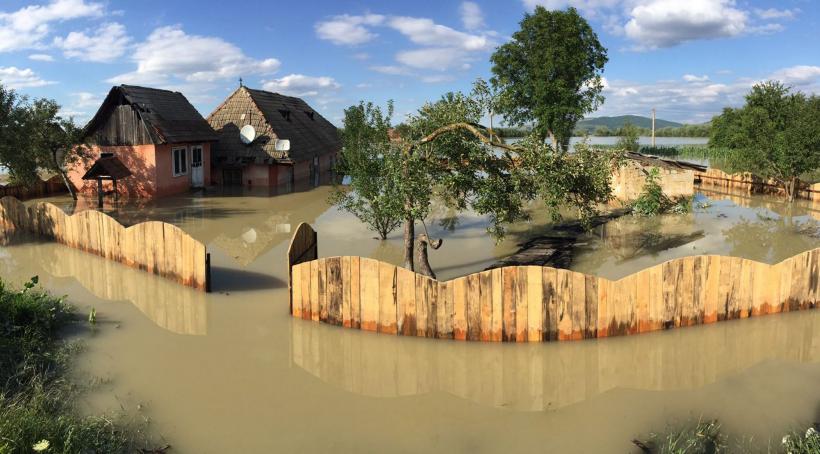 Bani pentru localităţile distruse de inundaţii