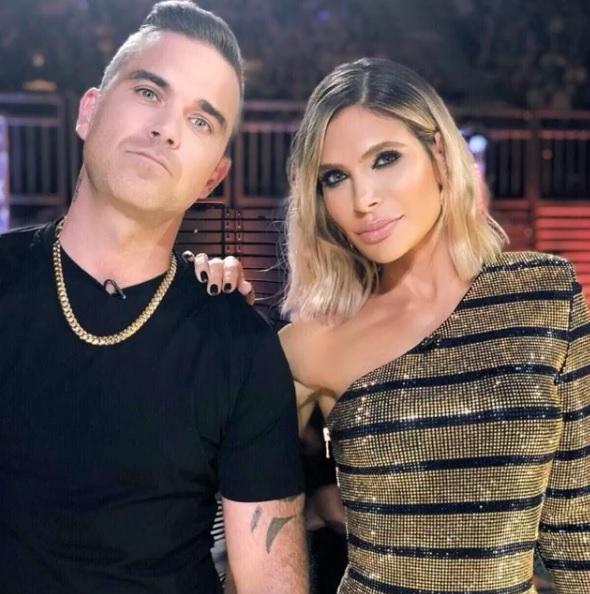 Robbie Williams şi soţia sa, Ayda Field, au devenit părinţii unei fetiţe
