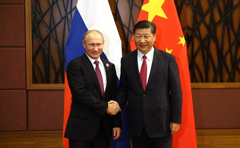 Vladimir Putin şi Xi Jinping au preparat împreună &quot;blinî&quot; şi au băut vodcă