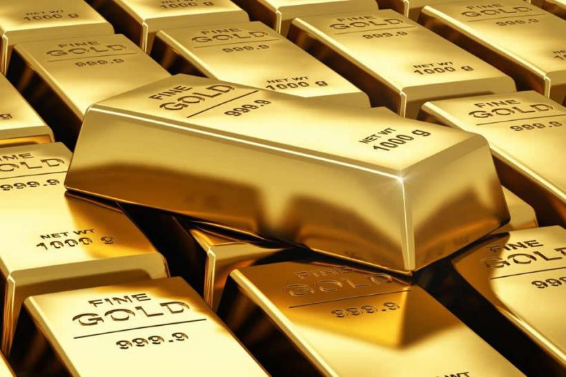 Preţul aurului a crescut pe fondul scăderii burselor