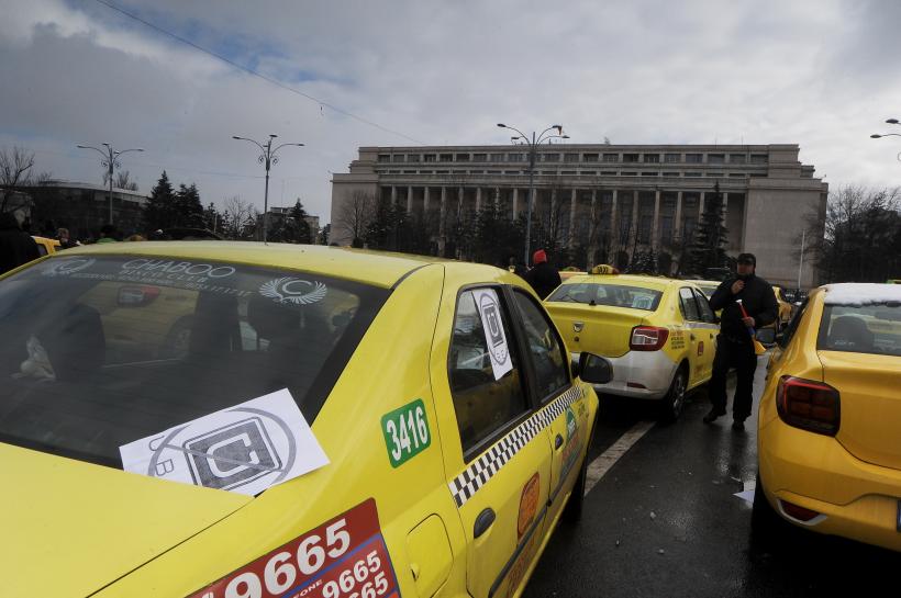 Guvernul a modificat legea privind transportul în regim de taxi 