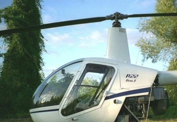 Şapte persoane au murit în urma coliziunii dintre un elicopter şi un avion ultrauşor