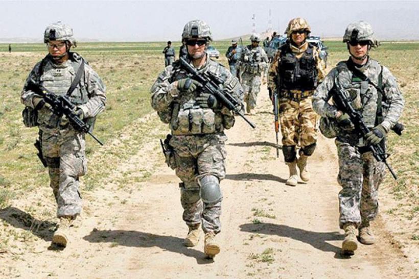 Militarii români din Irak vor fi relocați într-o altă bază NATO