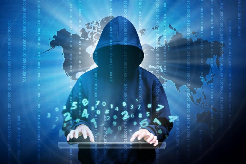 Percheziții în România și Republica Moldova la hackeri care ar fi atacat mai multe site-uri oficiale