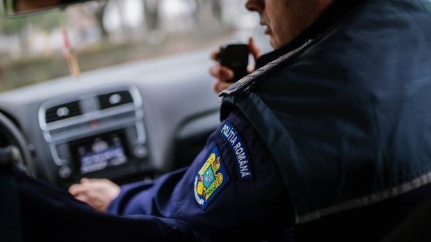 Oltean prins la volanul unei mașini cu inscripția „Carabinieri”
