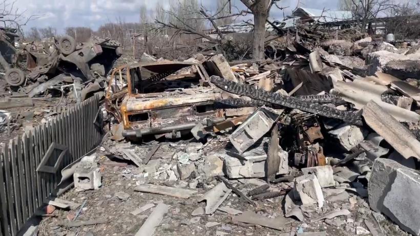 Tablou de război: un bocanc pe mijlocul străzii. Atât a mai rămas dintr-un om 18779947