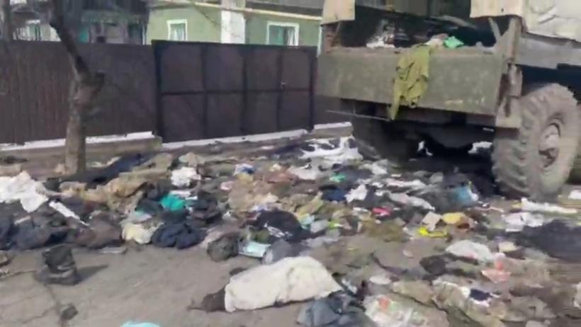 Tablou de război: un bocanc pe mijlocul străzii. Atât a mai rămas dintr-un om 18779952