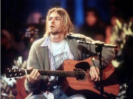 O chitară ruptă a lui Kurt Cobain şi o pereche de ochelari ai lui John Lennon, scoase la licitaţie 18808570