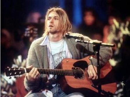 O chitară ruptă a lui Kurt Cobain şi o pereche de ochelari ai lui John Lennon, scoase la licitaţie