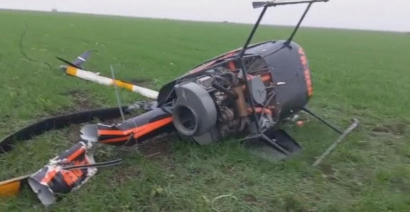 Accident aviatic în Timiș. Un elicopter a aterizat forțat și s-a răsturnat. Pilotul și elevul său au scăpat ca prin minune