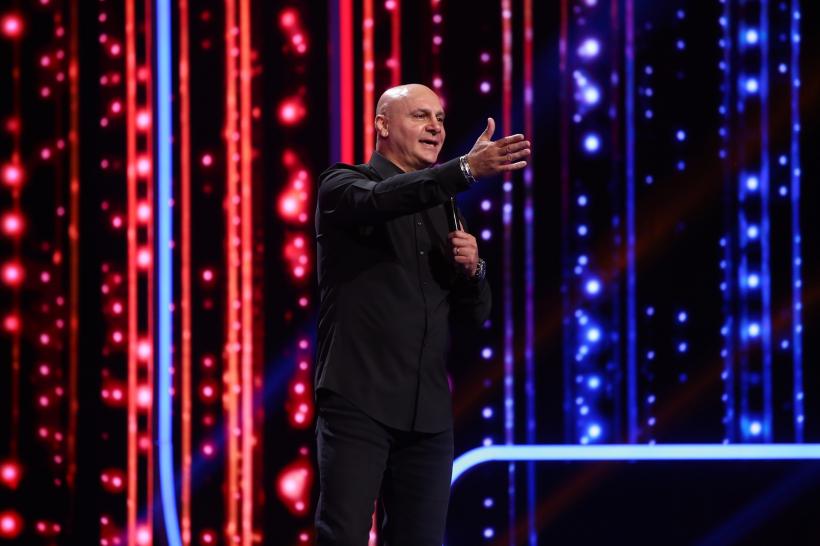 Dan Țuțu revine în postura de invitat special în cea mai nouă ediţie iUmor, difuzată sâmbătă, ora 20.00, la Antena 1. „Datorită acestei emisiuni, am ajuns la sute de spectacole naționale și internaționale!” 18873939