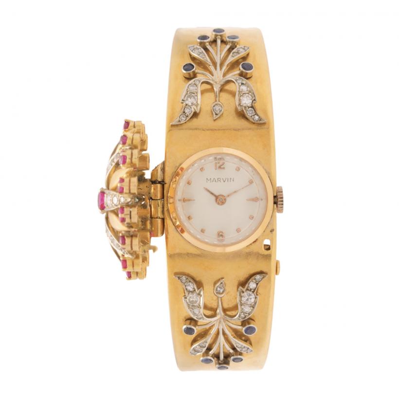 Cel mai cunoscut ceas James Bond  și 50 de carate de diamante, în licitație, de Mărțișor 18884677