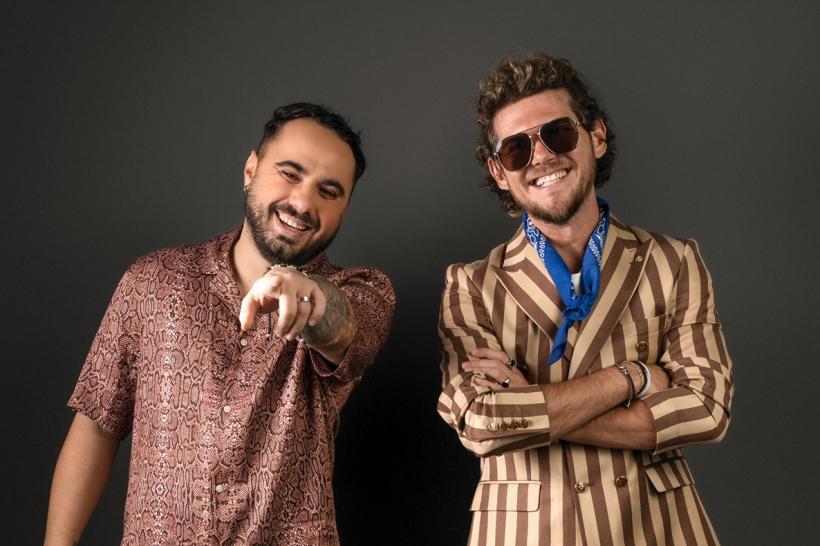 Emi și Cuza pășesc pe scena Te cunosc de undeva!  în ritmuri de Afrobeat și vor interpreta o piesă care a fost luni bune în vârful clasamentelor muzicale. Cuza: „Doamne ajută, maică!” 18897005