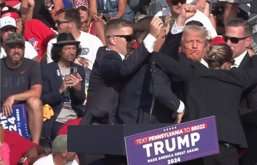 Donald Trump, rănit la un miting din Pennsylvania după un atac armat. „Am simțit că glonțul mi-a trecut prin piele, a curs mult sânge”. Un participant la miting a fost ucis de împușcături 18907637