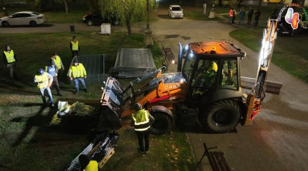 Nicușor Dan intră cu buldozerul în gardurile amplasate în zona Unirii. Angajați ai primăriei Sector 4, răniți 18922318