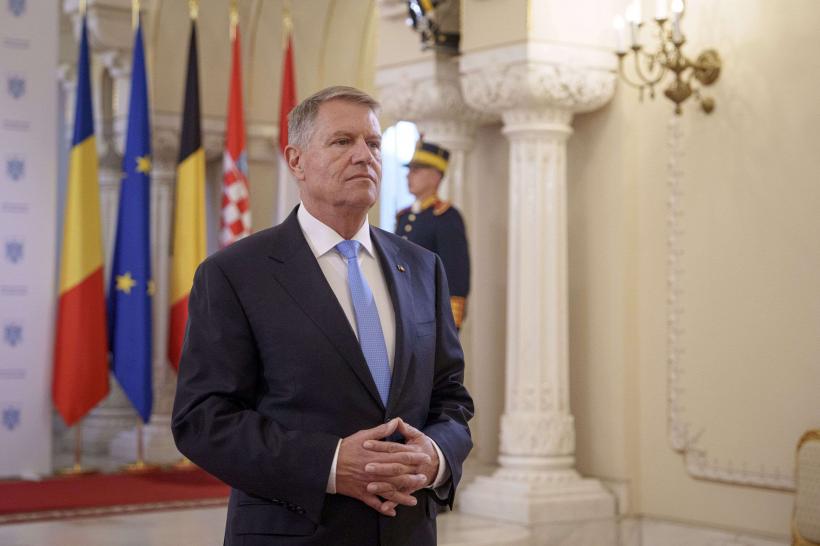 Iohannis promulgă legea de implementare a salariului minim european