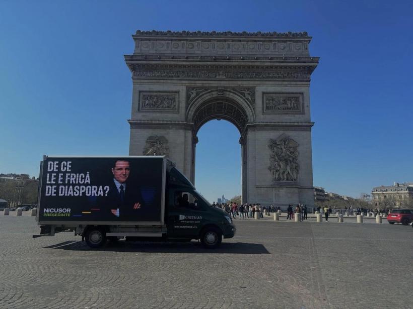 Panouri cu chipul lui Nicușor Dan și mesajul „De ce le e frică de diaspora? ” în mari orașe din lume