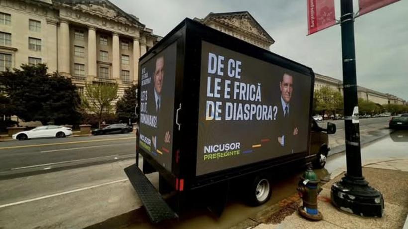 Panouri cu chipul lui Nicușor Dan și mesajul „De ce le e frică de diaspora? ” în mari orașe din lume 18947991