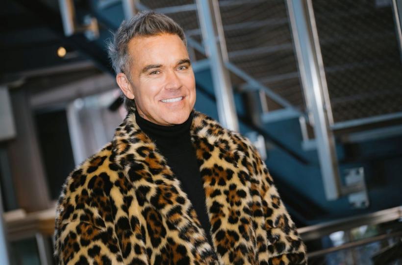 Robbie Williams face istorie. Noul album depășește Beatles în topurile din Marea Britanie 18991421