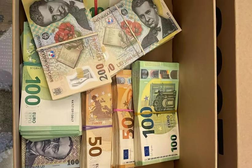 Comoara din vila șefului ARR: Sute de mii de euro ascunse în cutii de carton 