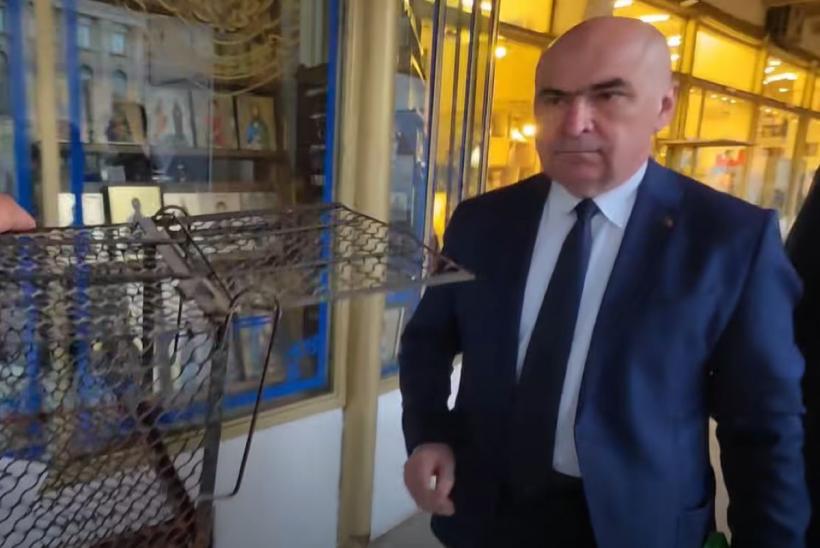  Ilie Bolojan, urmărit pe stradă cu o cușcă de șobolani