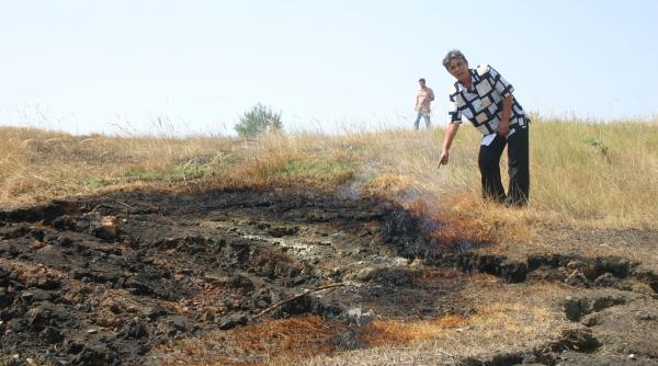 catunul asezat pe un deal de foc