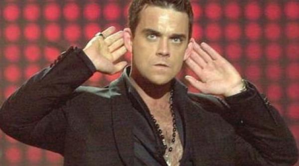 robbie williams din nou pe scena alaturi de take that