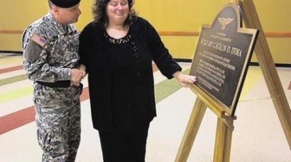 new york un roman ucis in irak da numele unui centru militar