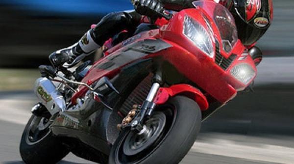 gonea cu 215 km h pe doua roti