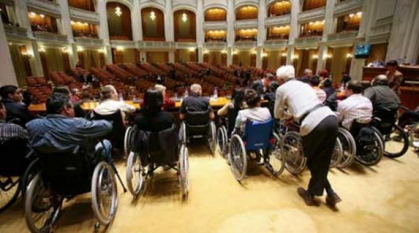 guvernul taie banii handicapatilor
