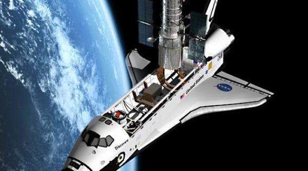 rezervorul extern al navetei spatiale discovery fisurat in patru locuri