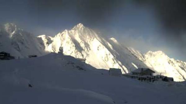 peisaj de iarna zapada si soare