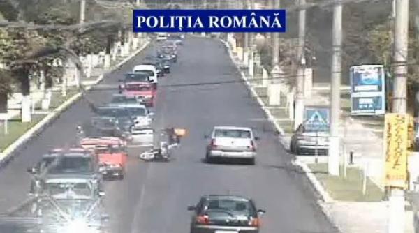 motociclist lovit in plin cu portiera de soferul unei masini pe dn1 video