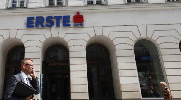 erste face pasul decisiv pentru preluarea integrala a bcr si amana din nou listarea bancii