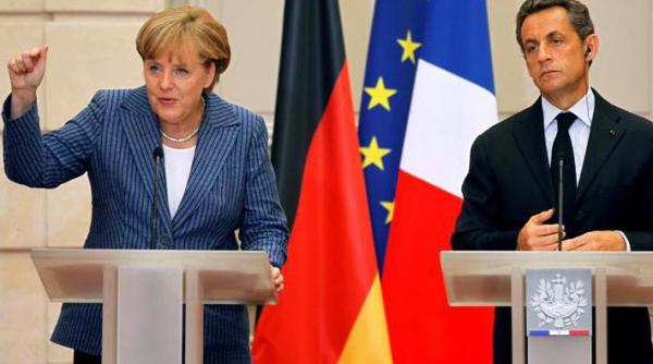 sarkozy si merkel dau asigurari ca grecia va ramane in zona euro